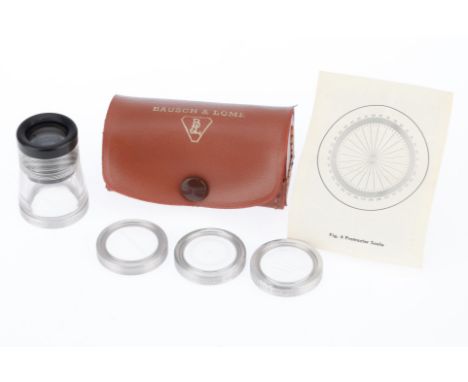 A Bausch &amp; Lomb Measuring Magnifier Set, to include the magnifier loupe, and 4 screw-in magnifiers, in the leather case w