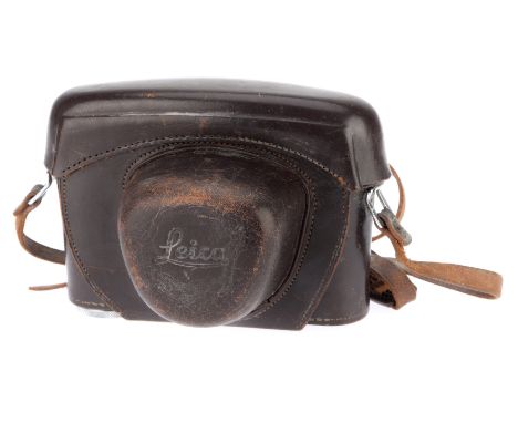 A Leica Camera Case, brown leather, G, with strap.