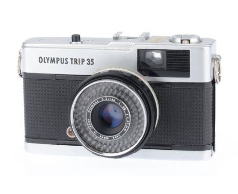 An Olympus Trip 35 Compact Camera, chrome, serial number 5354963, shutter working, camera appears to respond to light, body G