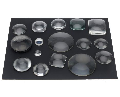 A Quantity of Glass Condenser Lenses, various sizes from 5 to 10cm, some appear to be in pairs, round and square variants.