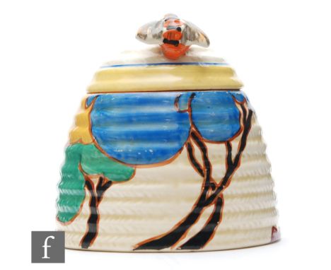 Clarice Cliff - Blue Autumn - A large Beehive honey pot circa 1930, hand painted with a stylised tree and cottage landscape w