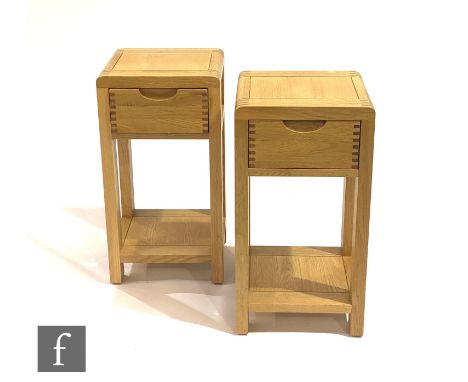 Ercol Furniture - A pair of light oak Bosco range compact side or lamp tables, each fitted with a single frieze drawer with r