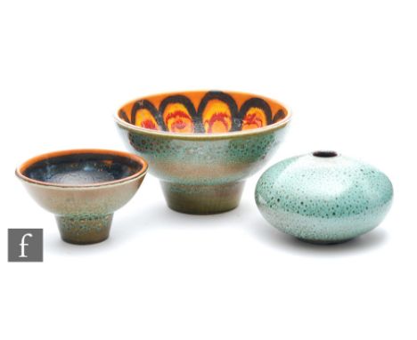 Poole Pottery - A stepped pair of Delphis bowls, each of footed form, shape 38 and 39, each decorated with a black abstract p