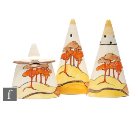 Clarice Cliff - Coral Firs - A Conical cruet set circa 1932, hand painted with a stylised coastal landscape with trees with t