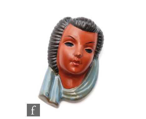 Adolf Prischl - Goldscheider - A small 1950s terracotta face mask modelled as a female head with brown black hair and draped 
