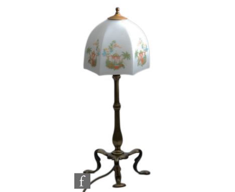 Faraday &amp; Son - An Arts &amp; Crafts brass Pullman table lamp, circa 1910, the three whiplash supports on leaf form feet,