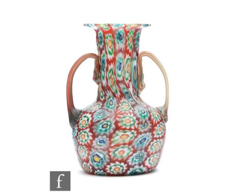 Fratelli Toso - A Murano glass vase, circa 1920, of ovoid form with tall collar neck and everted rim, formed of fused millefi