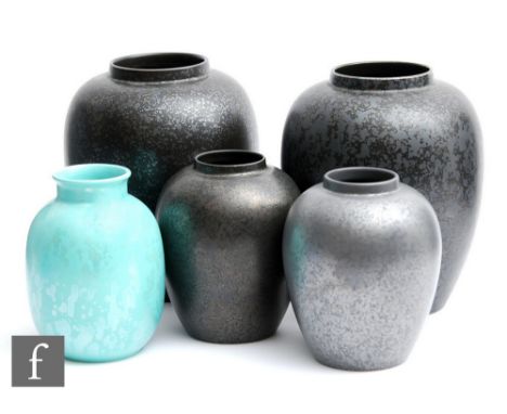 Poole Pottery - Five vases of assorted form comprising three with a black speckled glaze, one in grey and one in blue, all wi