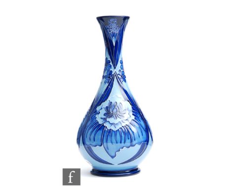 Rachel Bishop - Moorcroft Pottery - A bottle vase decorated in the Blue on Blue Eve pattern, impressed mark and signed R J Bi