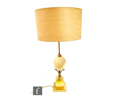 Manner of Anthony Redmile - An 'Ostrich egg' table lamp, the ceramic simulated egg raised on a square section gilt metal step