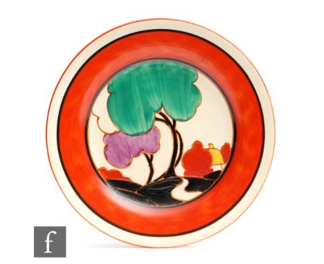 Clarice Cliff - Green Autumn - A circular side plate circa 1930, hand painted with a stylised tree and cottage landscape with