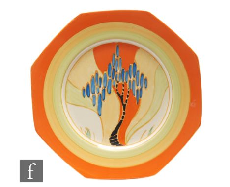 Clarice Cliff - Windbells - A large Octagonal plate circa 1933, hand painted with a stylised tree landscape within orange, ye