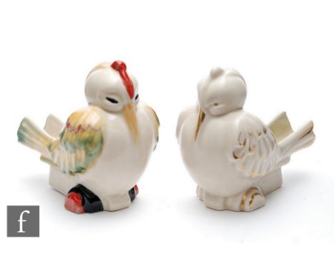 Clarice Cliff - Love Birds - A novelty pipe rest circa 1936, relief modelled as a stylised seated bird picked out in enamel c