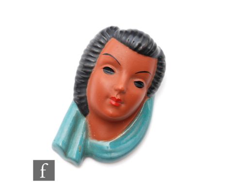 Adolf Prischl - Goldscheider - A small 1950s terracotta face mask modelled as a female head with brown black hair and draped 