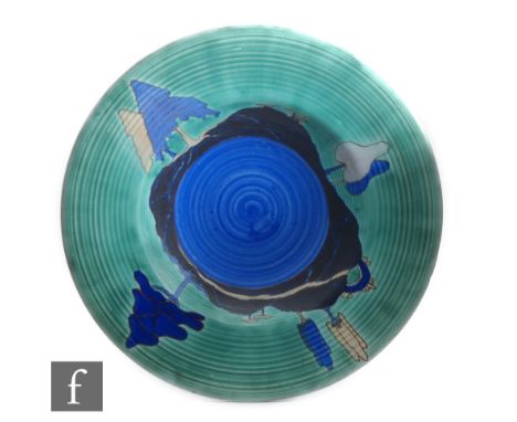 Clarice Cliff - Inspiration Caprice - An 18 inch ribbed charger circa 1930, radially hand painted with a tree landscape with 