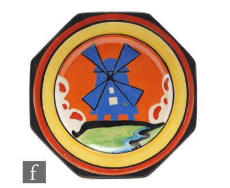 Clarice Cliff - Applique Windmill - An octagonal side plate circa 1930, hand painted with a blue windmill on a hill within bl