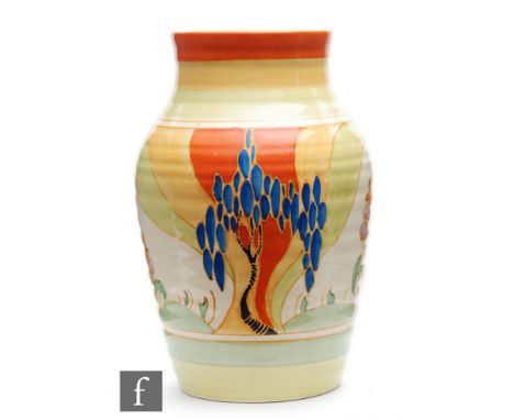 Clarice Cliff - Windbells - A 10 inch Isis vase circa 1933, hand painted with a stylised tree and flower landscape between or