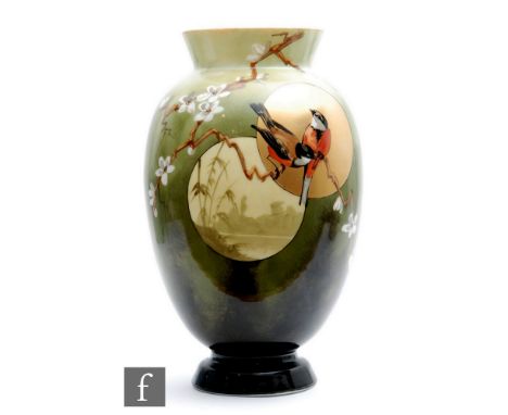 Baccarat - A Japonisme Birds, Moon and Cherry Blossom opaline glass vase, circa 1880, of footed baluster form, enamel and gil