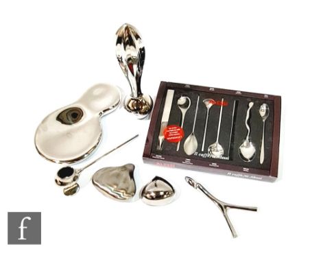 Alessi - A collection of items, to include a 'Valerio' Citrus Squeezer and Pestle, a 'Virgula Divina' bottle opener, a&nbsp;'