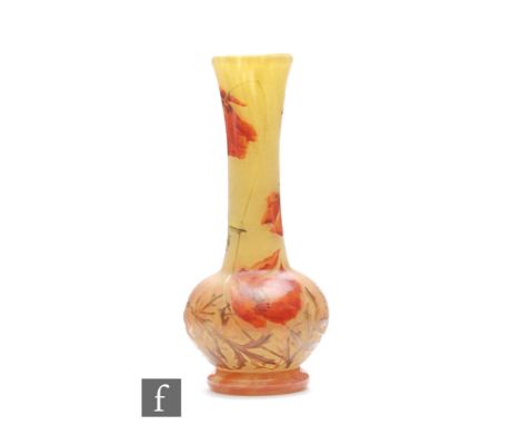 Daum - An early 20th Century cameo and enamelled glass vase of footed globe and shaft form, cased, cut and enamelled with flo