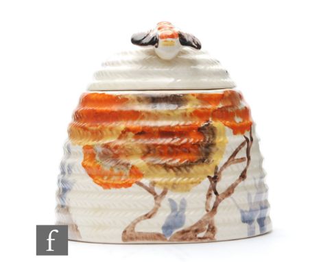 Clarice Cliff - Rhodanthe - A large Beehive honey pot circa 1934, hand painted with a stylised tree landscape, Bizarre mark, 