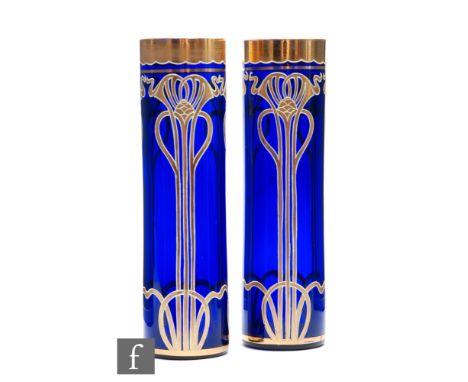 Unknown - Bohemian - A pair of continental Art Nouveau glass vases, each of sleeve form, with gilded decoration highlighted i