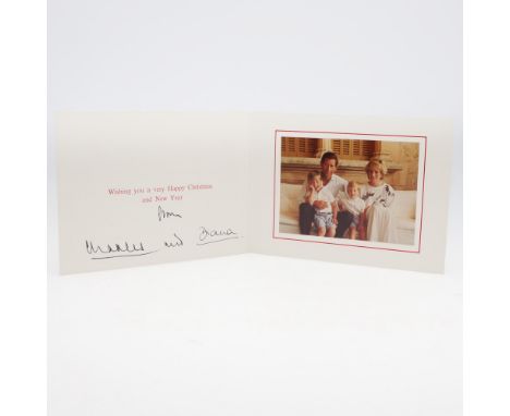 Diana, Princess of Wales. Christmas and New Year Card, folded, signed 'from Charles and Diana', with mounted image of Prince 