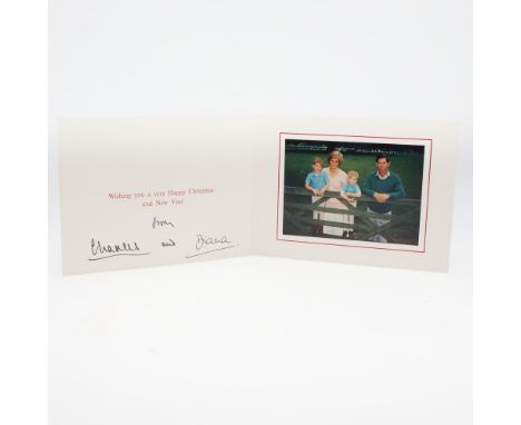 Diana, Princess of Wales. Christmas and New Year Card, folded, signed 'from Charles and Diana', with mounted image of Prince 