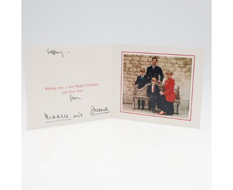 Diana, Princess of Wales. Christmas and New Year Card, folded, signed 'Geoffrey- from Charles and Diana', with mounted image 