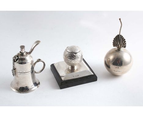 AN EDWARDIAN GOLF BALL INKWELL on a wooden base by Messrs. Hutton & Sons Ltd., Birmingham 1909, a "grenade" table lighter, Bi
