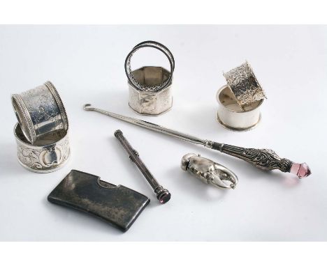 A MIXED LOT:- A nickel-plated vesta case in the form of a crab claw, an Edwardian card case, an Edwardian column-type dip-pen