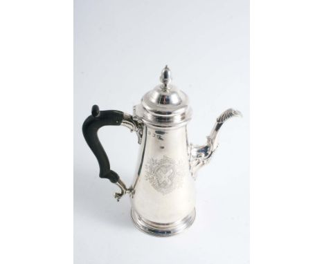 A GEORGE II COFFEE POT of tapering form with a "tucked-in" circular base, a domed cover with a ribbed, acorn finial and a dec