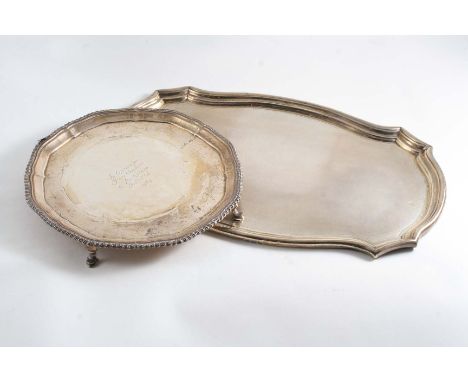 A SHAPED RECTANGULAR DRESSING TABLE TRAY with a moulded border & engine-turned surface, no apparent maker's mark, London 1919