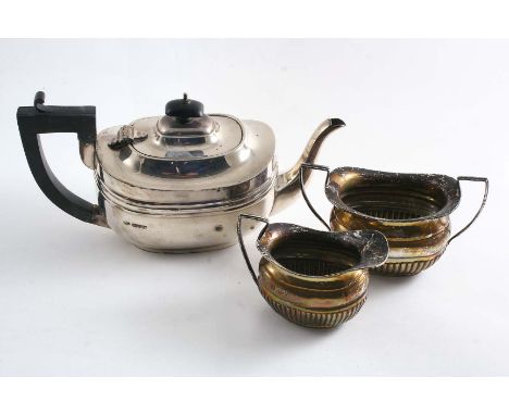 A SMALL TEA POT with a moulded girdle, inscribed, by Aldred Marston, Chester 1921 together with a non-matching cream jug and 