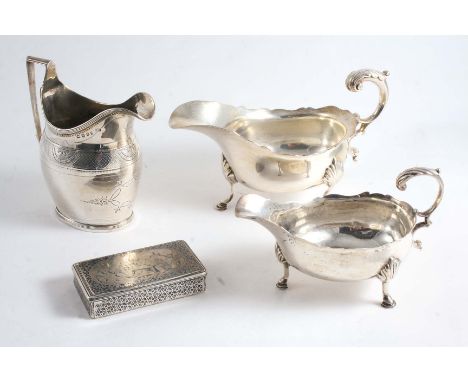 A MIXED LOT:- A George III small sauce boat on three legs, London 1770, a George III engraved oval milk jug, London 1796, an 