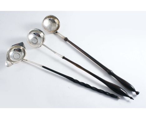 A GEORGE III PUNCH LADLE  with a whalebone handle & a coin-inset bowl, London 1790, another with a circular coin-inset bowl a