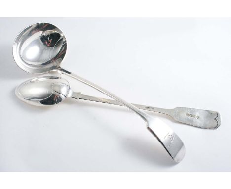 IRISH PROVINCIAL INTEREST:- An Edwardian Fiddle pattern soup ladle & matching basting spoon, both crested to match, by Messrs