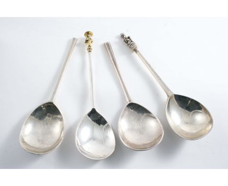 REPLICAS OF EARLY SPOONS:- A St. Nicholas apostle spoon with inscribed stem, by L.A. Crichton, London 1936, an apostle spoon 