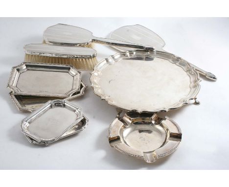 A MIXED LOT:- A waiter of shaped circular outline with a moulded border by the Barker Brothers, Birmingham 1913, a pair of sm