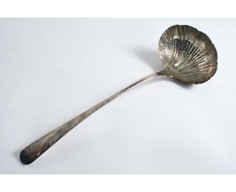 A GEORGE III OLD ENGLISH PATTERN SOUP LADLE with a beaded & fluted bowl, crested, by Albrecht Borchers, London 1769;  11.7"  