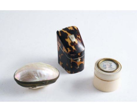 A VICTORIAN TORTOISESHELL NEEDLECASE in the form of a knife box, an ivory pill box set with a miniature portrait and a mother