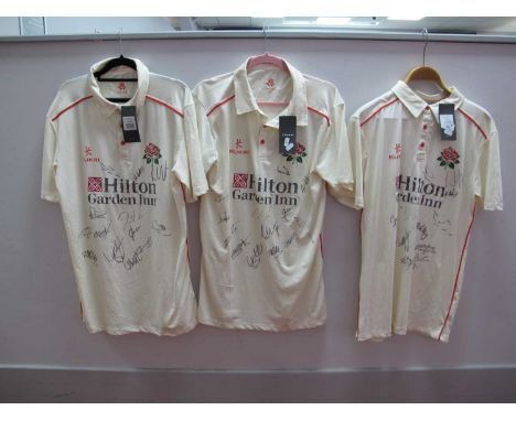 Cricket - Lancashire Kukri Short Sleeve Ivory Shirts, with Hilton Garden Inn logo, each multisigned. (3)