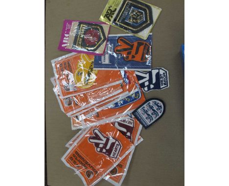 Dead Stock Cloth Patch Badges, twelve in original packaging including P &amp; G Hearts, Everton, Manchester United, Coffer v.
