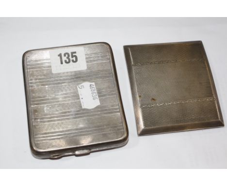 A 1920's silver cigarette case, engine turned, Chester 1927 and another 1920's silver cigarette case, inscribed inside 'Natio