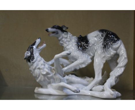 A Rosenthal porcelain group of two Borzoi Dogs playing, printed mark and handgemeitt, impressed 1599, 14.5cm high 