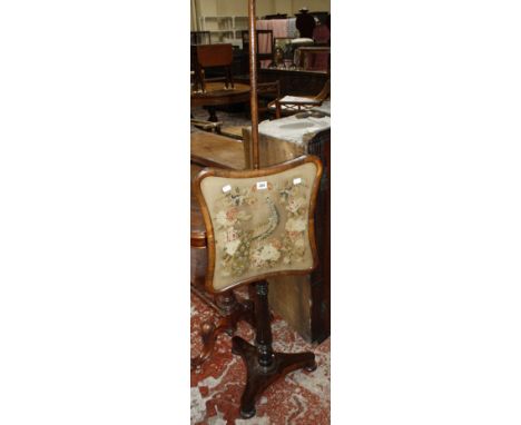 A Victorian rosewood pole screen with a tapestry banner decorated with peacock on a triform base, 150cm high  Best Bid