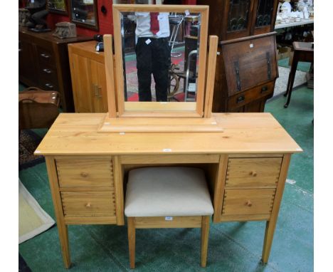 A contemporary light oak dressing table, free-standing adjustable mirror above an oversailing rectangular top and four short 