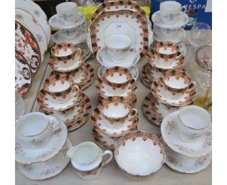 An Edwardian Stanley China part tea service, for twelve, comprising cups, saucers, side plates, bread and butter plates, milk