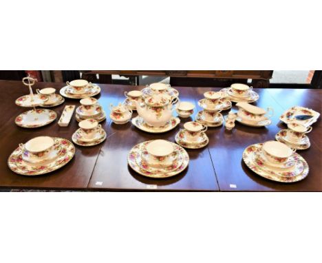 A Royal Albert Old Country Roses pattern dinner and tea service, for six, comprising dinner plates, dessert plates, side plat