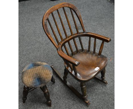 A 19th century elm child's rocking chair; a similar stool (2)